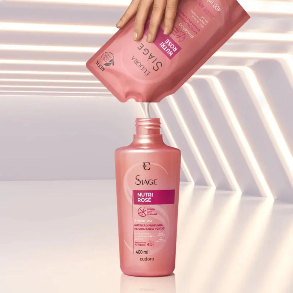 Close do produto mostrando textura cremosa do condicionador Siàge Nutri Rosé Refil 400ml