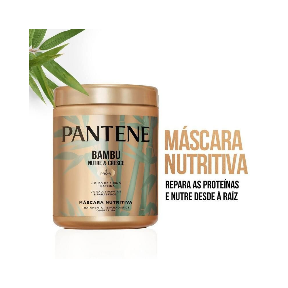 Embalagem dourada da Máscara Pantene Bambu Nutre & Cresce com folhas de bambu ao fundo