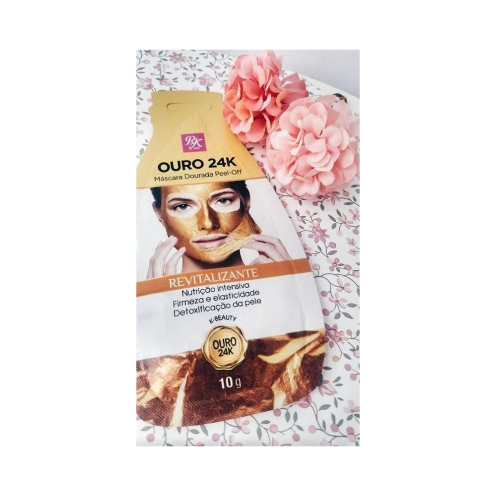 Sachê da Máscara RK Ouro 24K Peel-Off sobre superfície branca com flores